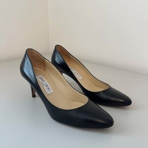 Jimmy Choo Black Leather Rounded Toe High Heel Pumps | Size 38.5